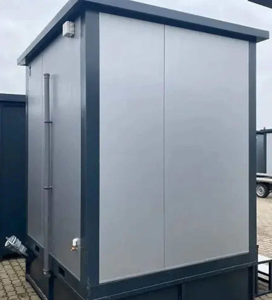 Contenedor sanitario WC Box 2x2 m con cabina doble – módulo prefabricado compacto con doble acceso para obra